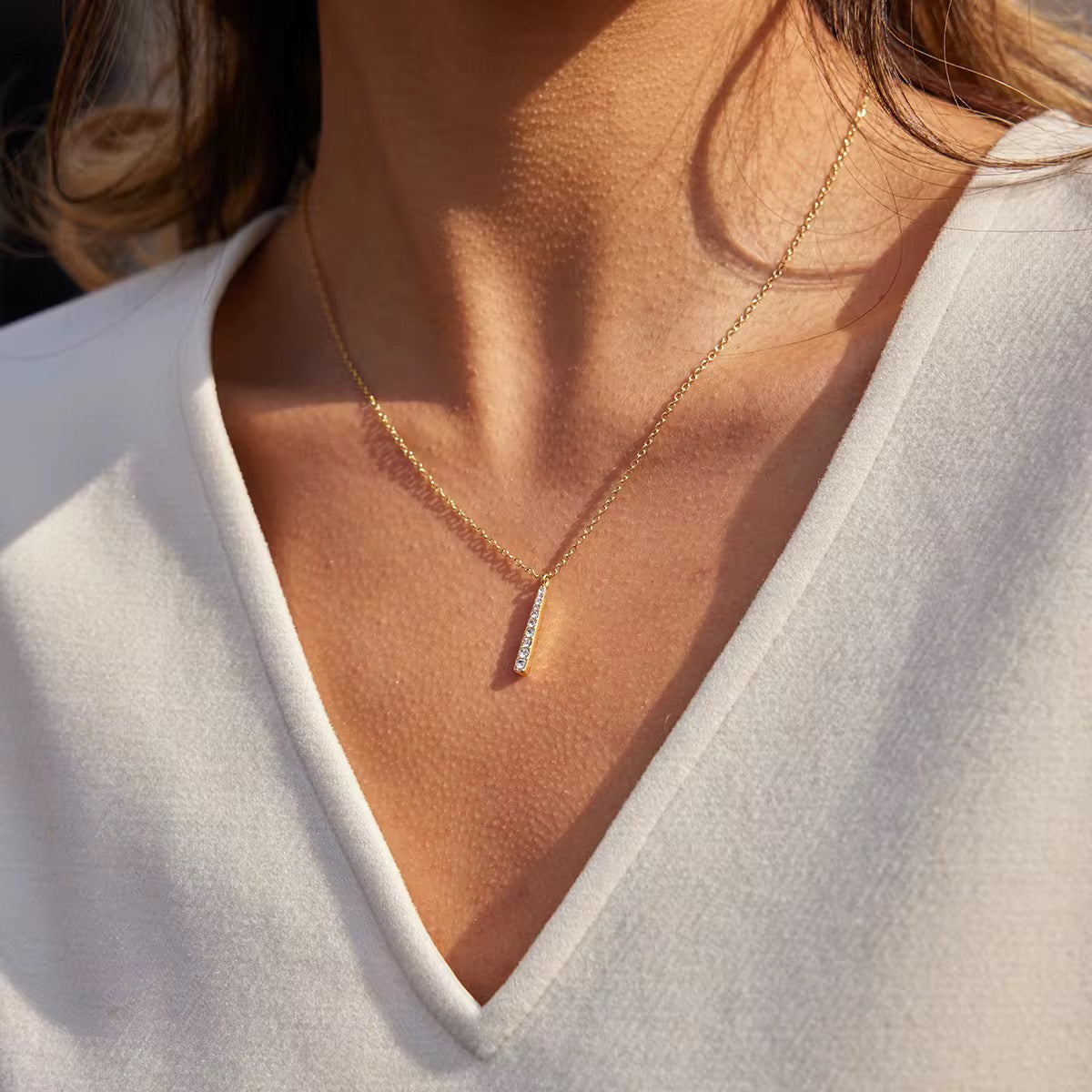 Radiant Line Pendant Necklace – 18K PVD Gold with Cubic Zirconia